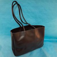 Borsa FURLA color marrone a tracolla.