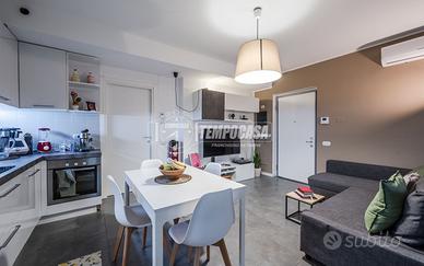 ELEGANTE BILOCALE CON GIARDINO PRIVATO - CLASSE EN