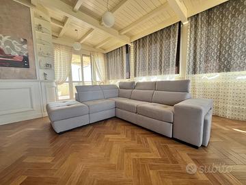 Divano letto angolare in tessuto grigio tortora