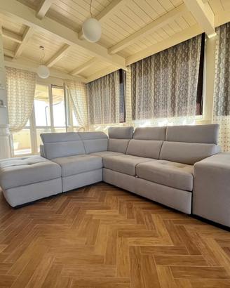 Divano letto angolare in tessuto grigio tortora