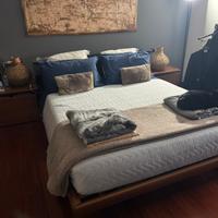Camera da letto  con armadio a tre ante  Poliform