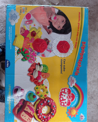 Giochi passeggino,casetta,chitarra,chocolateria