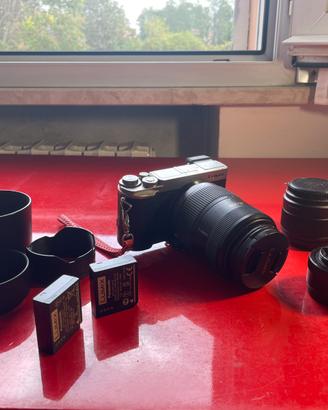 Bundle Fotocamera Lumix mirrorless + 3 obbiettivi