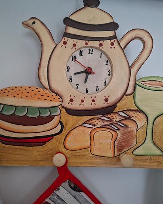 orologio da parete  con appendini strofinacci 