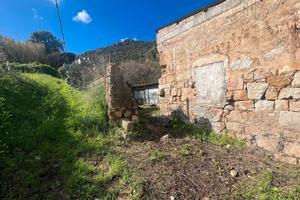 Guspini- Terreno in zona G con ricovero