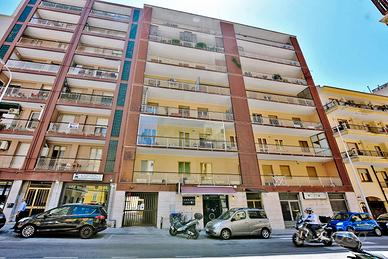 Ampio appartamento con 2 balconi e garage