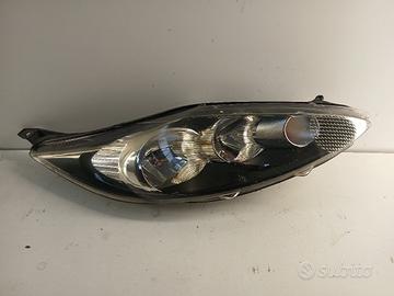 Faro ant dx FORD FIESTA VI '08
