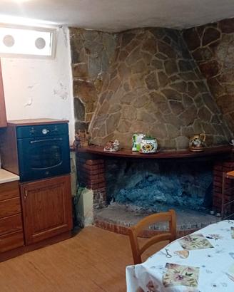 Terreno con fabbricato e frutteto