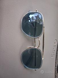 Ray-Ban unisex montatura oro lenti blu