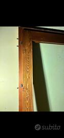 Telaio e porte  a due ante in legno con vetrate