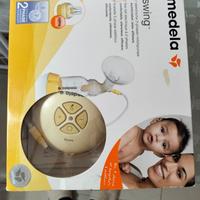 Tiralatte e cuscino allattamento