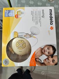 Tiralatte e cuscino allattamento