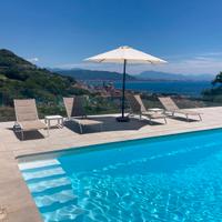 Splendido appartamento con piscina e posto auto