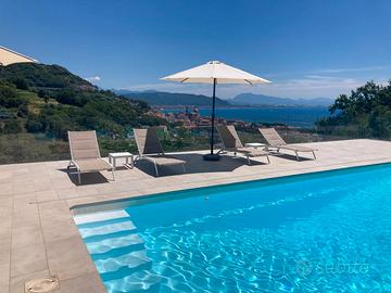 Splendido appartamento con piscina e posto auto