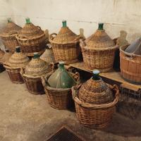 DAMIGIANE RIVESTITE IN VIMINI