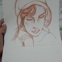 Donna disegnata con matita bronzo