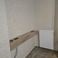 Consolle sospesa per retro divano