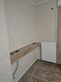 Consolle sospesa per retro divano