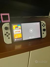 Switch OLED + Giochi + Accessori