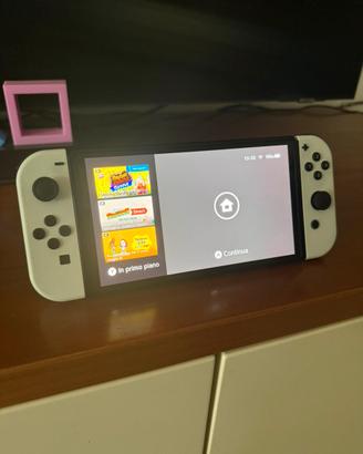 Switch OLED + Giochi + Accessori