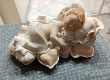 Scultura di Giuseppe Armani Bambino che dorme