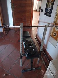  panca con bilancieri e  pesi 