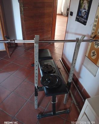  panca con bilancieri e  pesi 