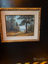 Quadri con cornice in legno dorata