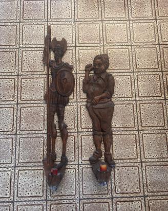 Coppia sculture da parete in legno intagliato