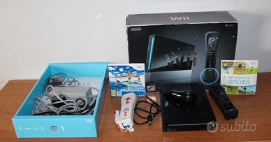 Nintendo Wii console + 2 giochi