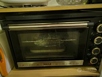 Forno Elettrico ventilato con girarrosto e timer 