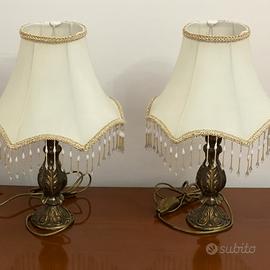 Coppia lampade vintage con frange e base decorata