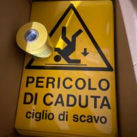 Vari cartelli di pericolo e nastri Tubo gas