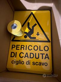 Vari cartelli di pericolo e nastri Tubo gas