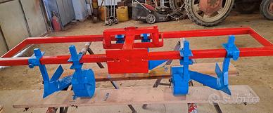Attrezzo sarchiatore per motocoltivatore + zappe