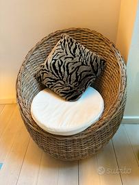 Poltrona in rattan con cuscino