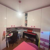 Cameretta angolare  con doppio letto 