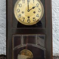 Orologio a parete con pendolo