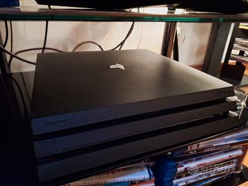 PS4 Pro + 2 controller + 8 giochi