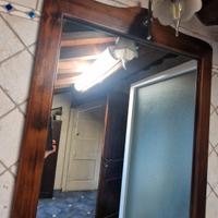 specchio  in legno con  applique 