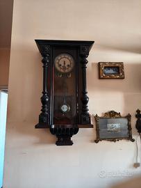 Orologio a pendolo da parete