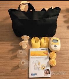Tiralatte Medela Freestyle DOPPIO con accessori