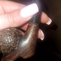 pipa in legno intagliata 