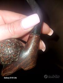 pipa in legno intagliata 