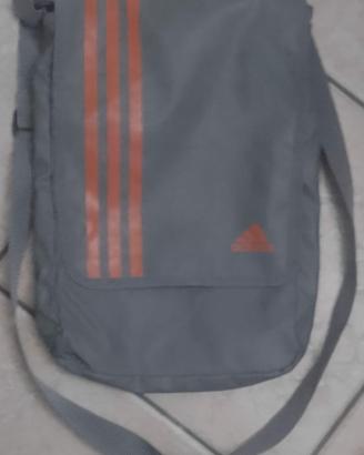 Borsa a tracolla Adidas grigia con strisce arancio