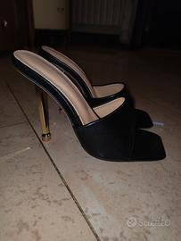 scarpe nere eleganti con tacco dorato