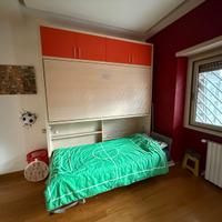 Letto a castello Molteni a scomparsa , come nuovo.