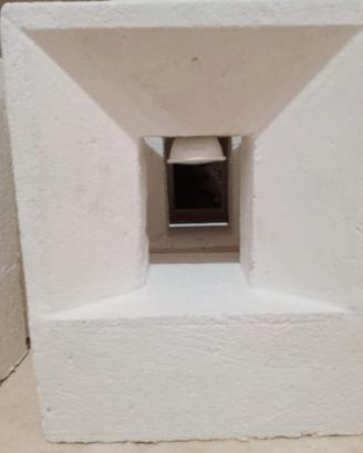 Luce da esterno realizzata in tufo