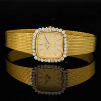 Omega De Ville lady 60s 18 kt gold diamonds bezel