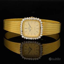 Omega De Ville lady 60s 18 kt gold diamonds bezel